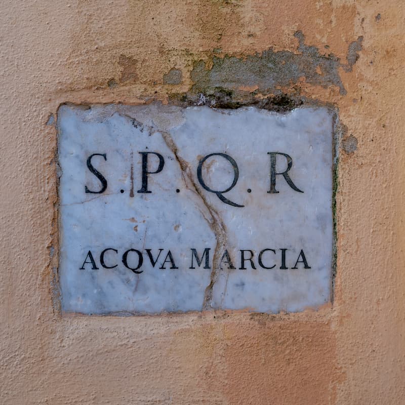 Roman street sign saying SPQR ACQUA MARCIA